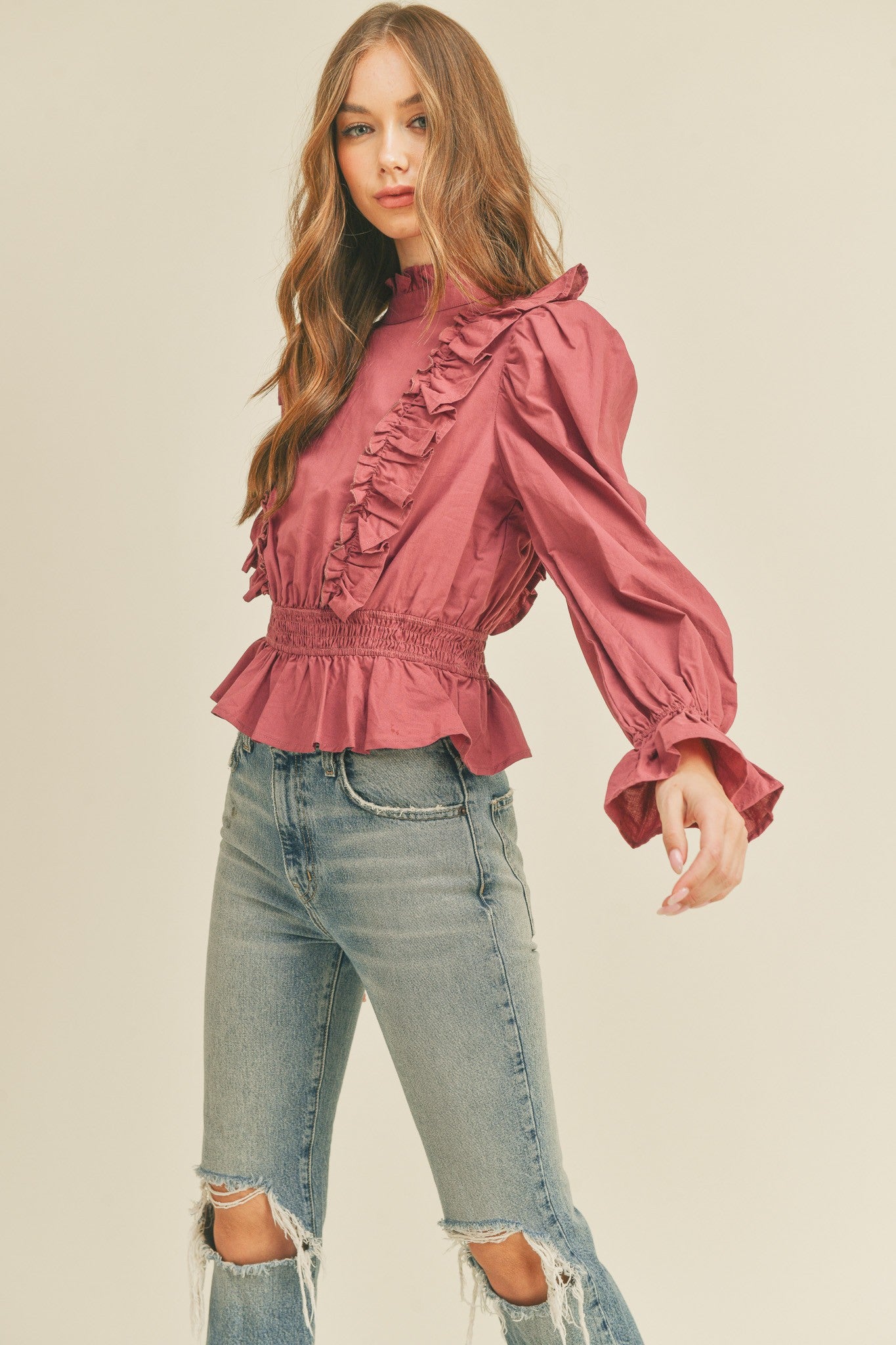SMOCKED WAIST RUFFLED HIGH NECK BLOUSE