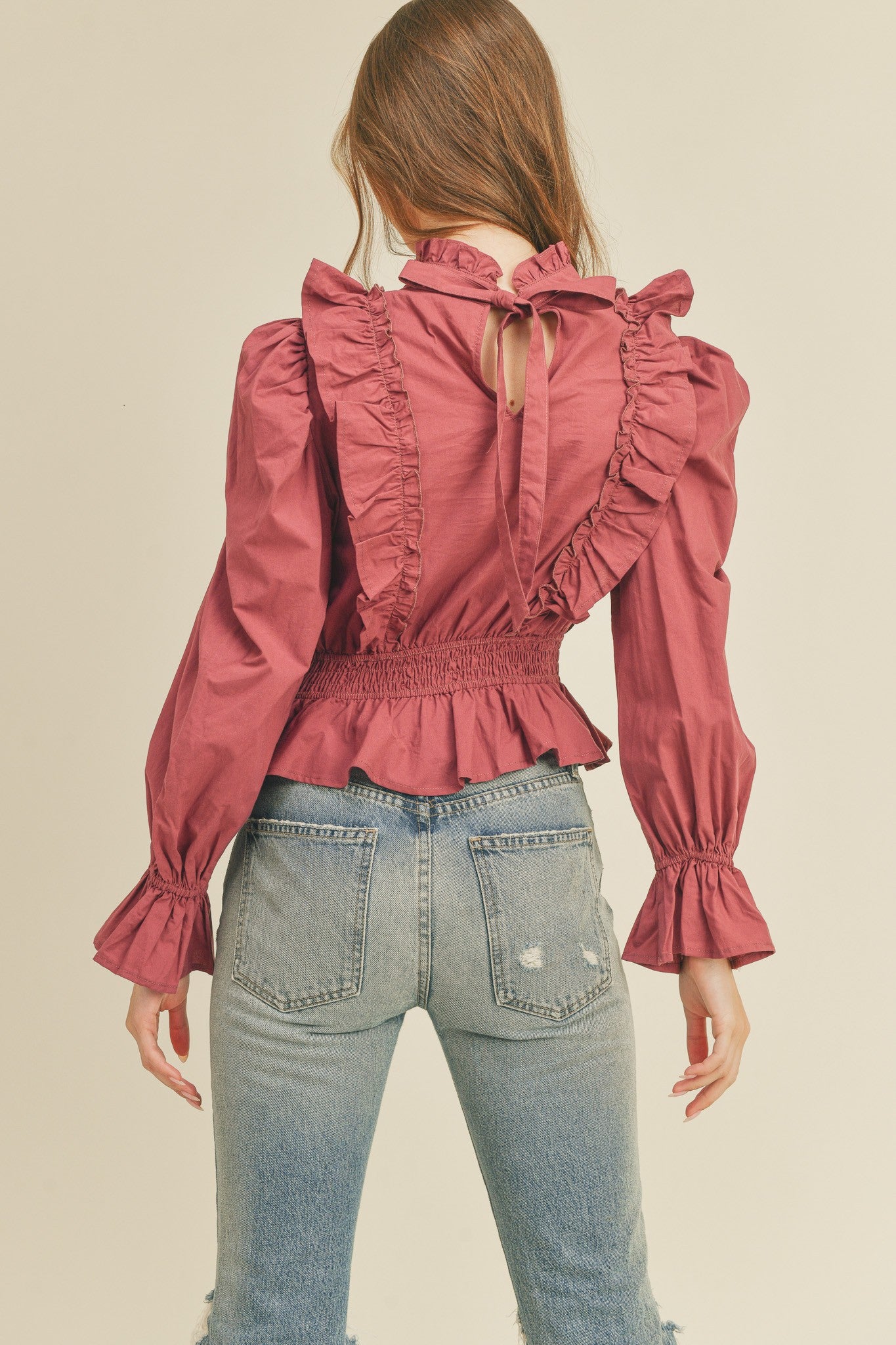SMOCKED WAIST RUFFLED HIGH NECK BLOUSE