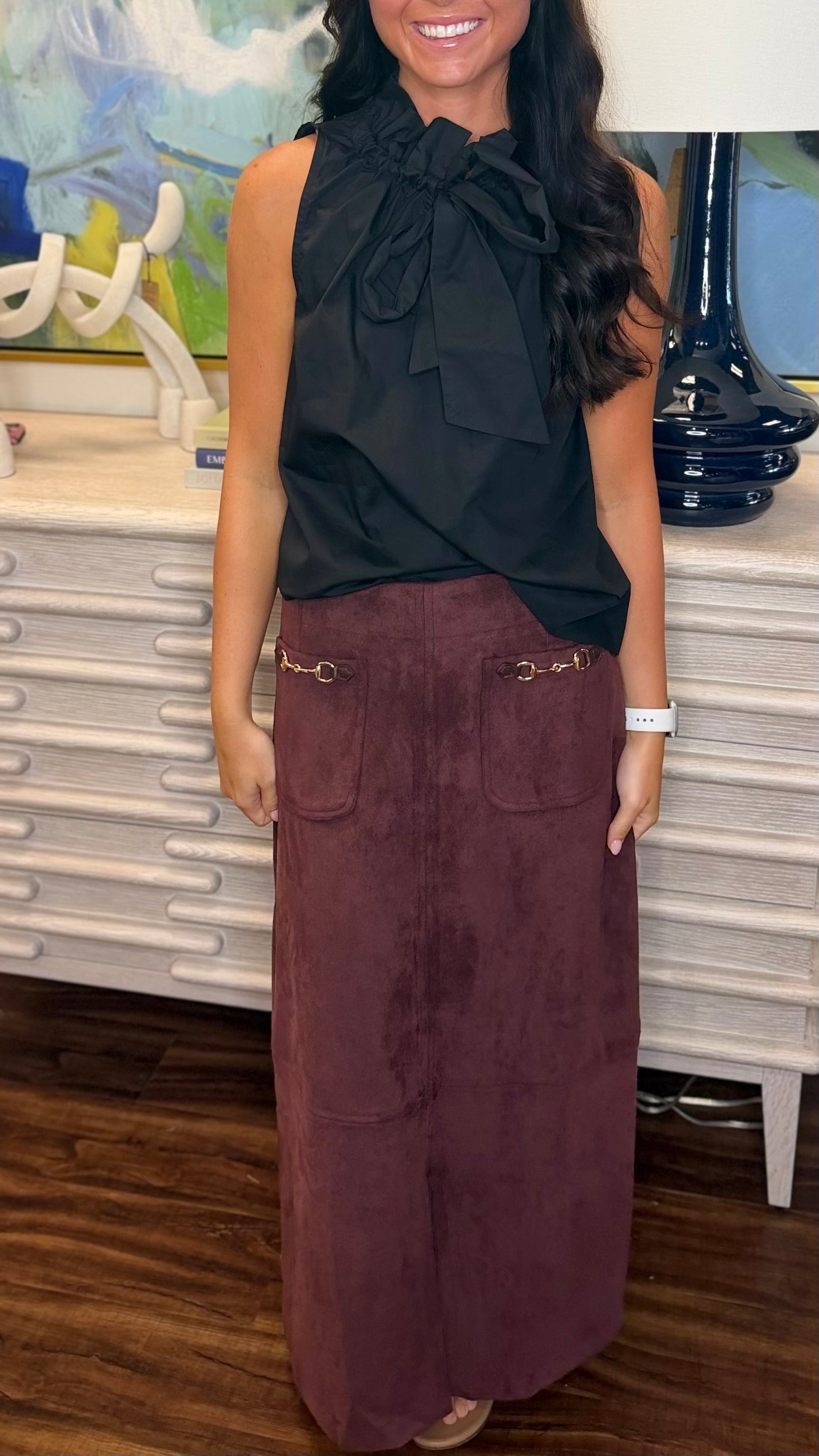 The Claret Skirt, a burgundy faux suede midi from Papori's fall and winter 2026 market buy