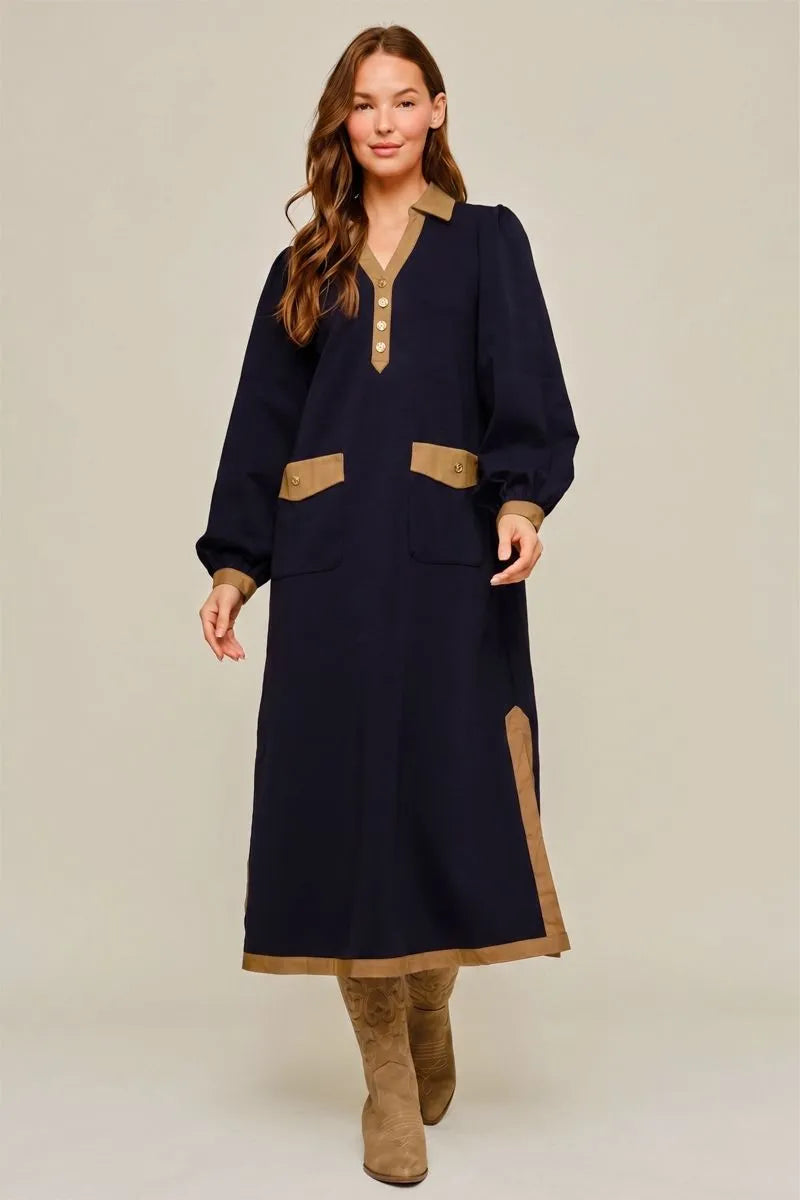 Vivie Dress in black — front view with camel contrast trim