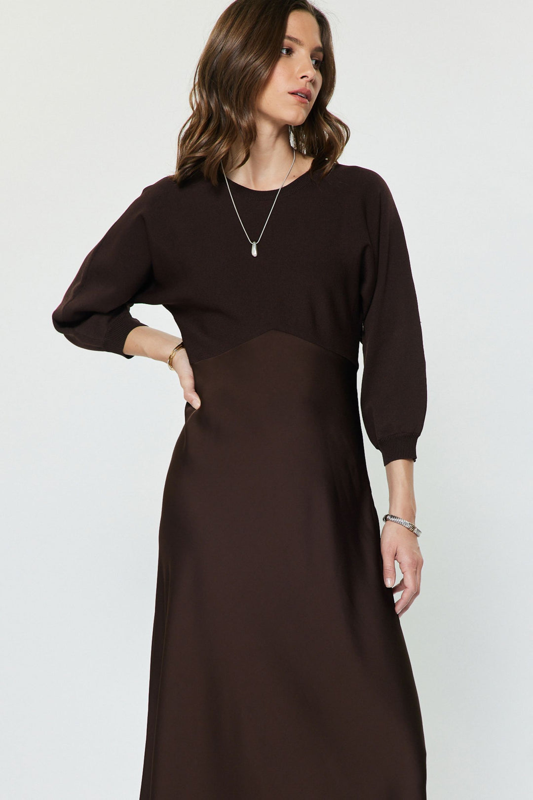 Verity Dress in Chocolate — sweater-knit bodice with 3/4 sleeves and flared satin midi skirt