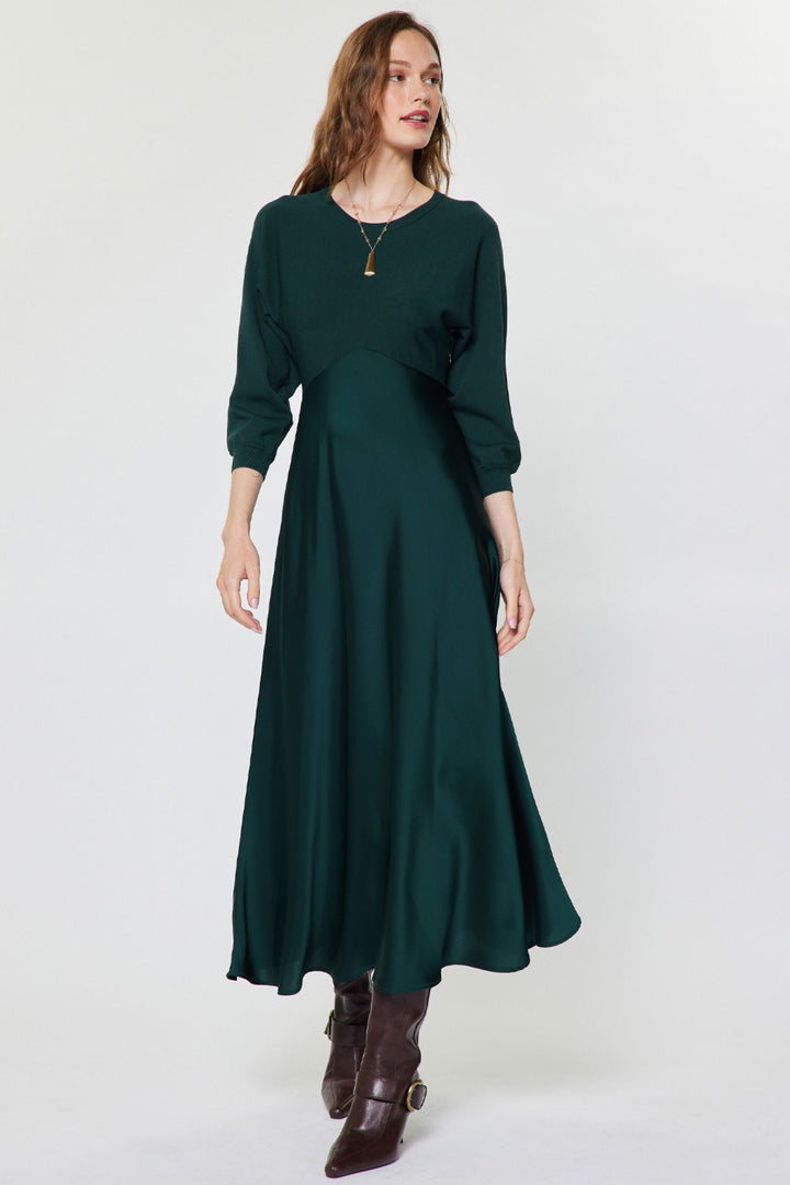 Verity Dress in Dark Green — sweater-knit bodice with 3/4 sleeves and flared satin midi skirt