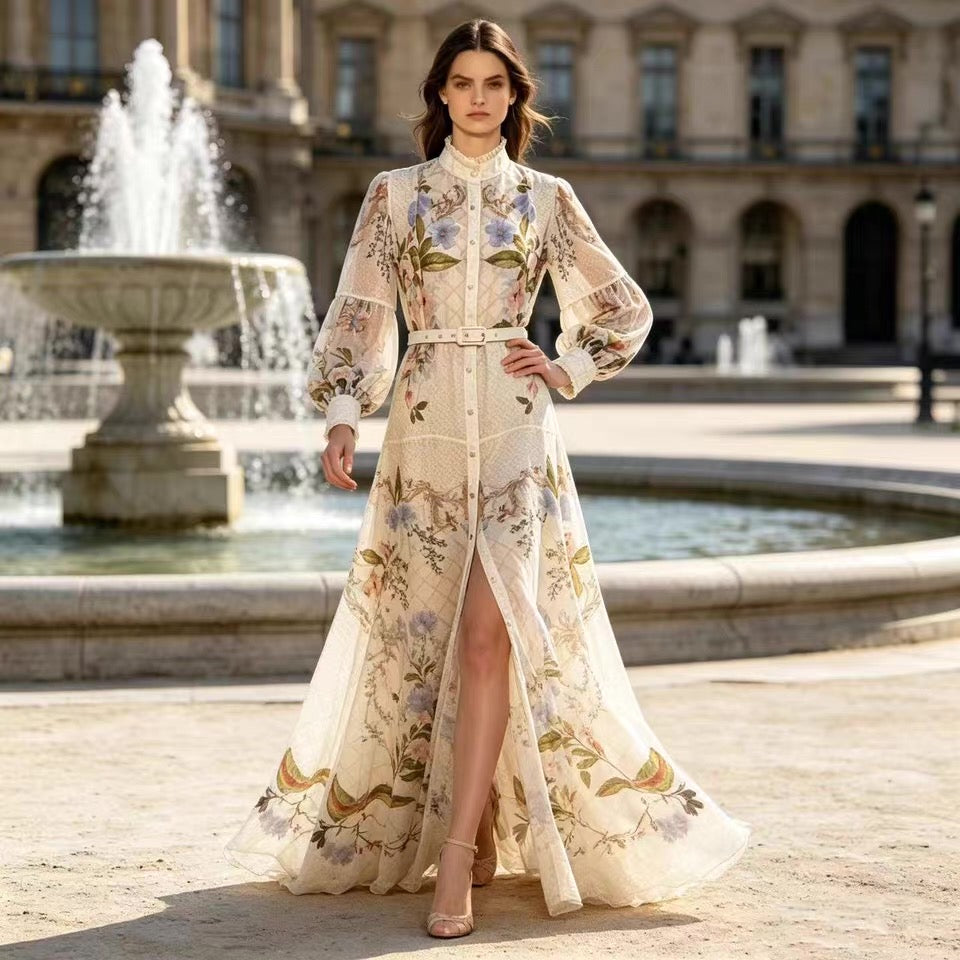 Lennox Dress in beige floral print with ruffled collar, puff sleeves, and belted maxi skirt