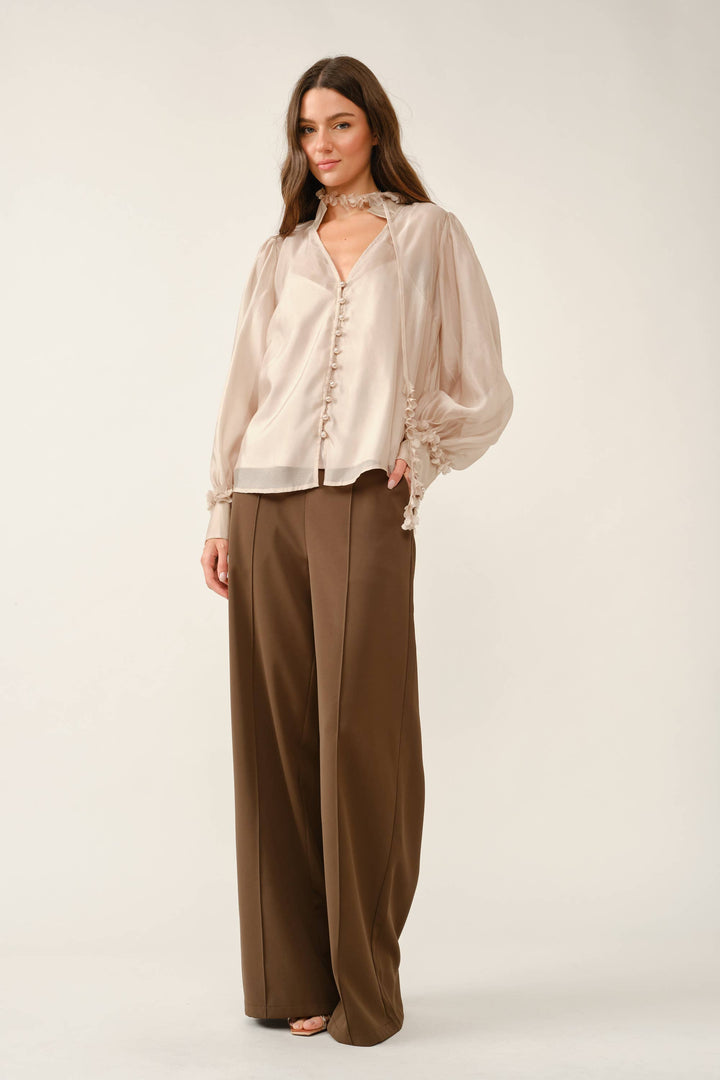 Lisette Blouse in champagne — front view showing the floral tie-neck