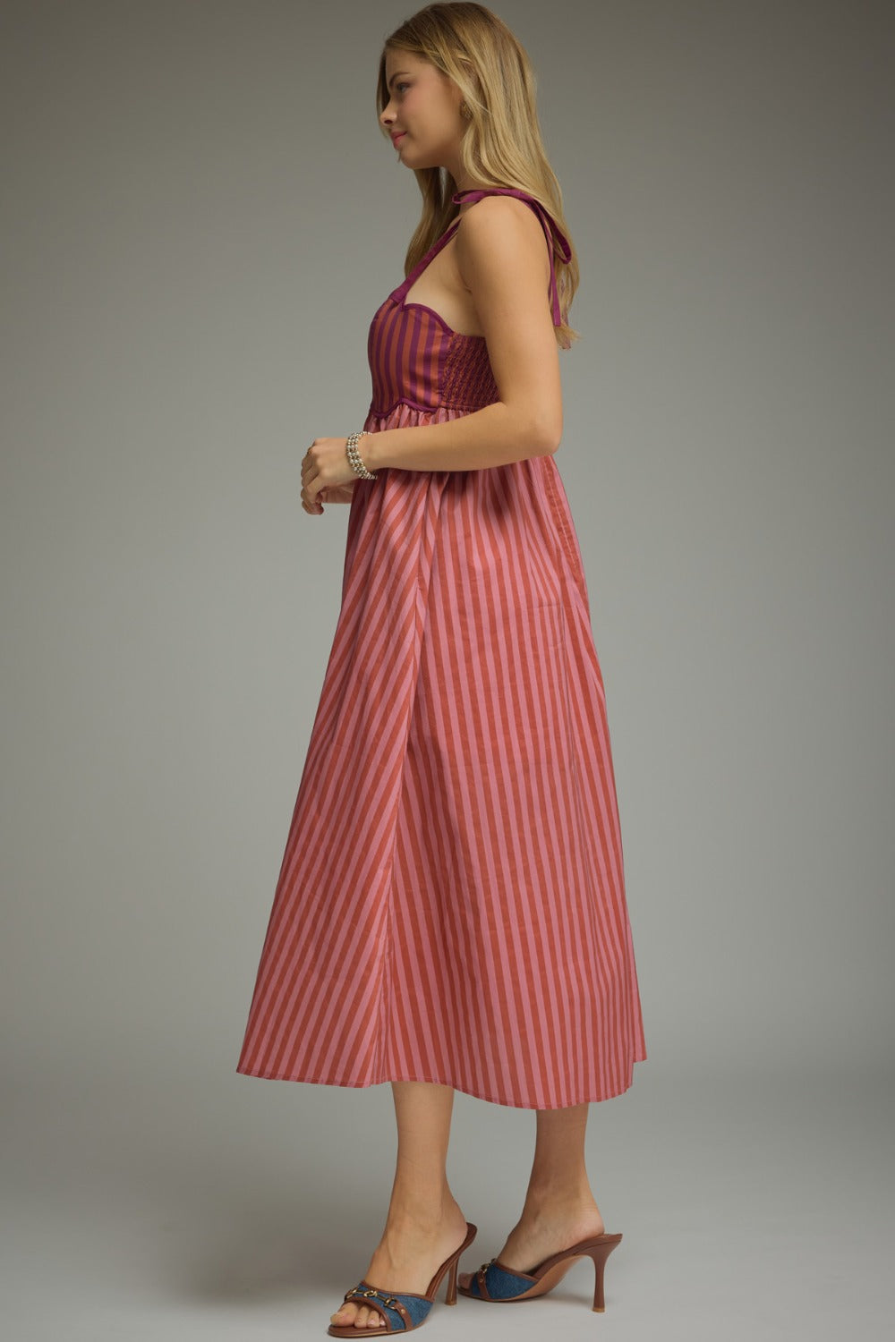 Lorna Dress in Plum — three-quarter view