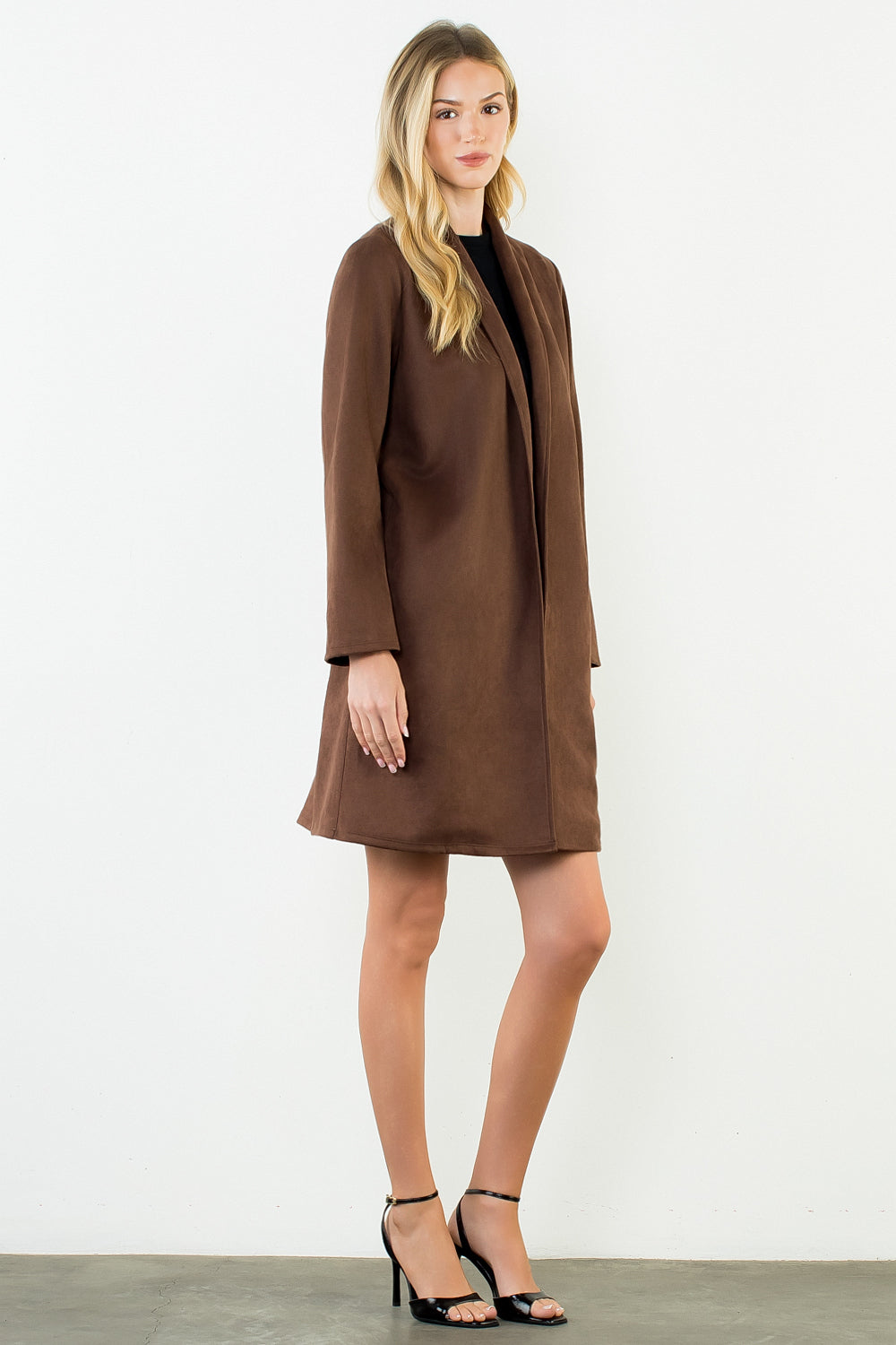 Briar Coat in brown — three-quarter view