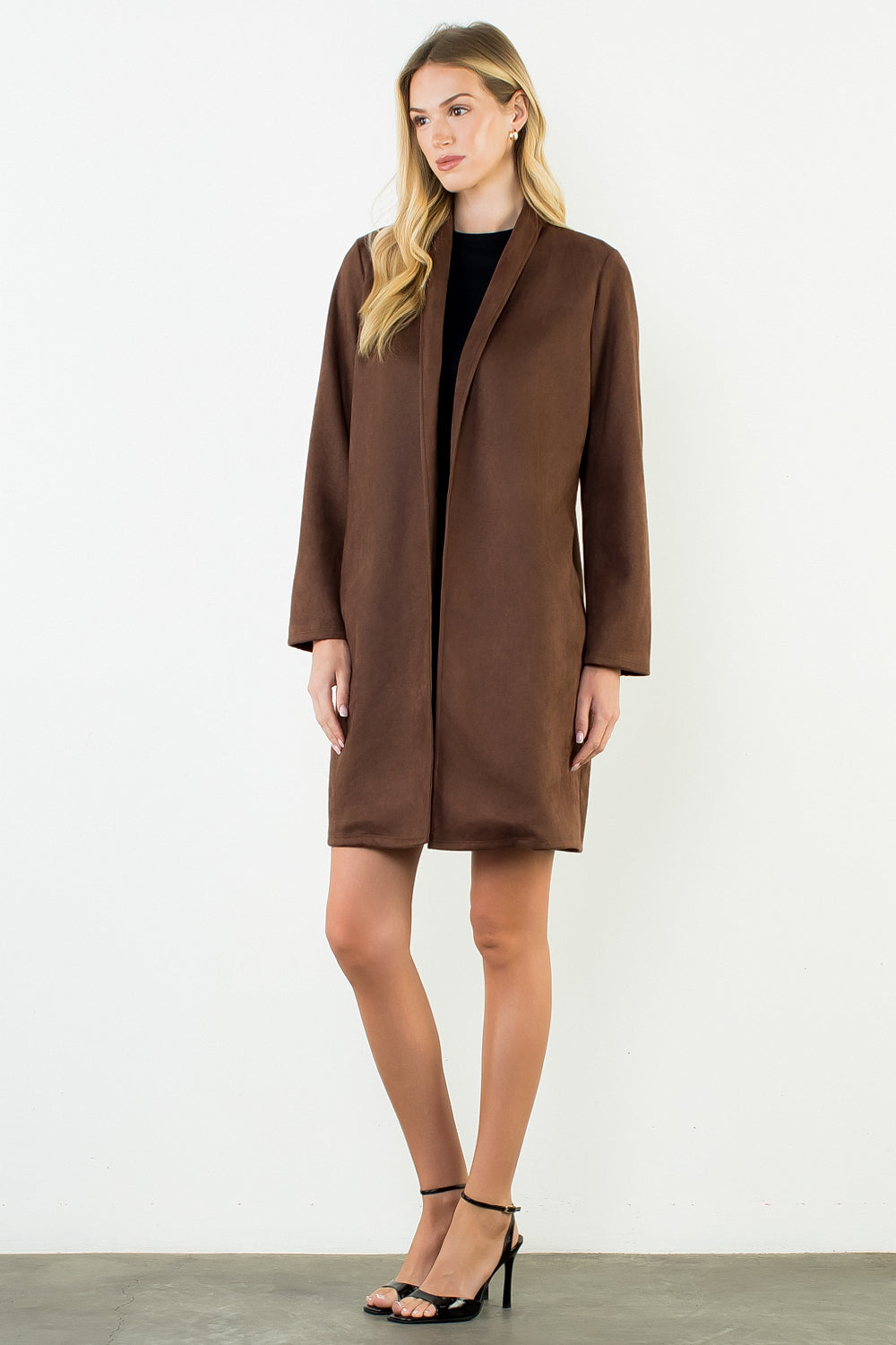 Briar Coat in brown — front view worn open over black