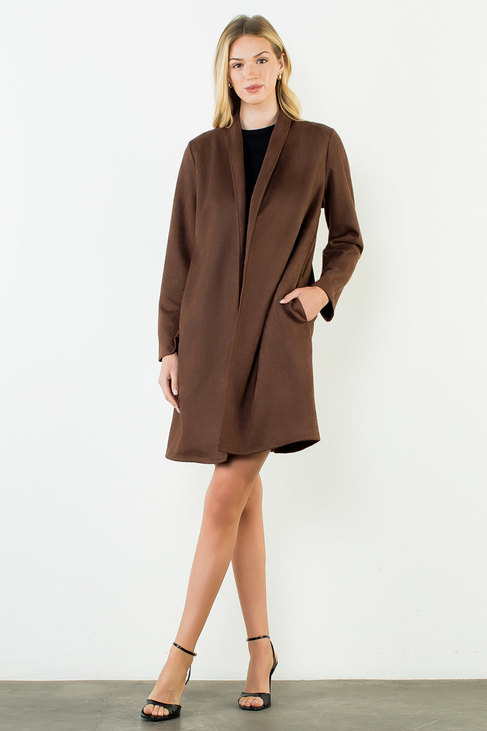 Briar Coat in brown — side pocket detail