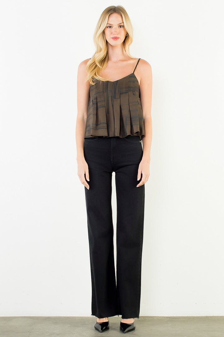 Anya Top in brown zebra print — full-length styled with black trousers